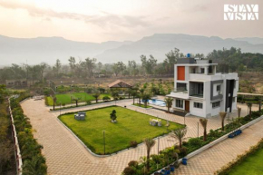 StayVista's Oasis Of Solace - Mountain-View Villa with Pool Deck, Kids Zone, Turf & Gazebo